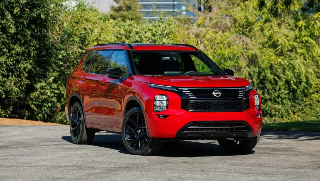Front exterior view of the 2026 Nissan Rogue Plug-In Hybrid with updated grille and LED lights.